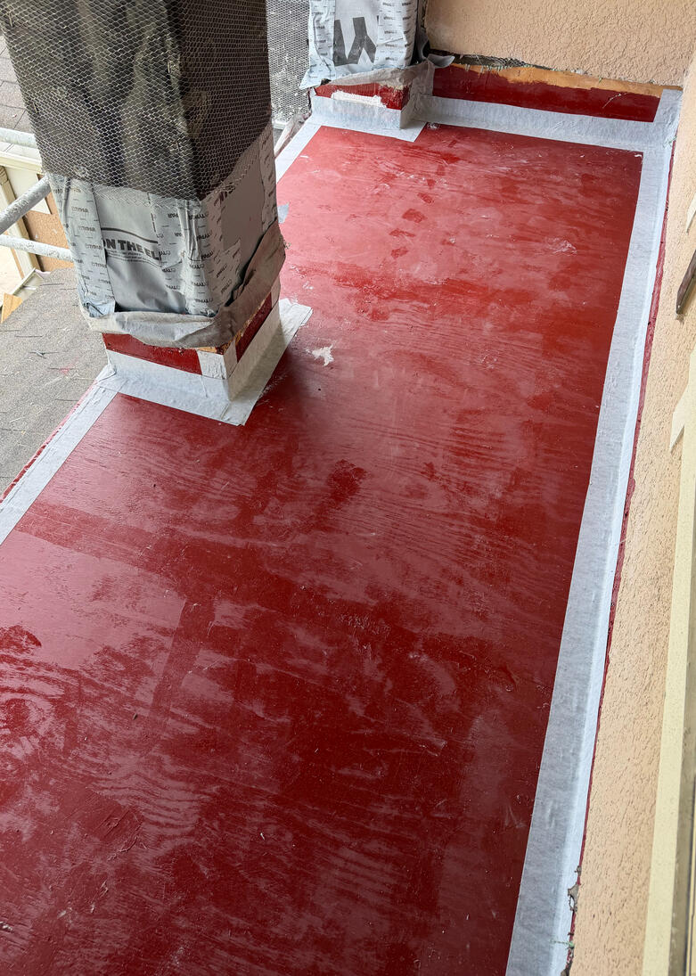 This foundational stage establishes a moisture-resistant base using a penetrating epoxy primer. The substrate is reinforced with polymeric rubberized tape and elastomeric sealant to secure all joints prior to the final coating. This foundational stage establishes a moisture-resistant base using a penetrating epoxy primer. The substrate is reinforced with polymeric rubberized tape and elastomeric sealant to secure all joints prior to the final coating.